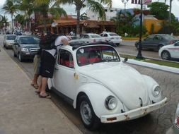 white volkswagen beetle