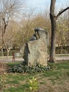 stone sculpture in the spring park