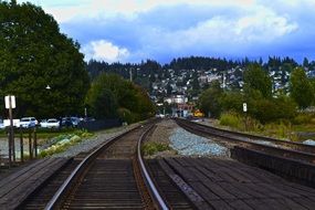 free railway tracks in front of city