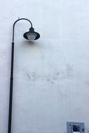 street lamp against a white wall