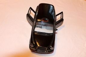 car with rear doors open as a model