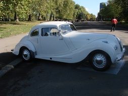 white retro car on the street