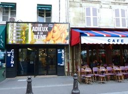 exterior of a cafe on a street of Paris