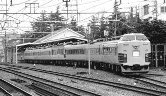 black and white photo of a japanese train