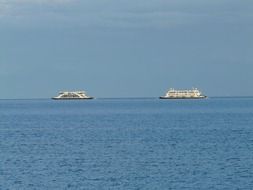 ftwo distant ships on sea