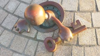 metal figure in modern style on the road close up