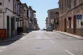 deserted city street on a sunny day