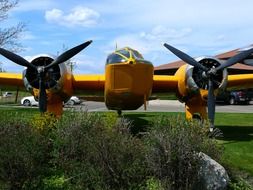 yellow plane with two propellers