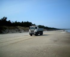 truck on the beach of the Baltic Sea