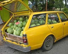 car loaded with watermelons