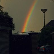 beautiful rainbow after rain on the sky