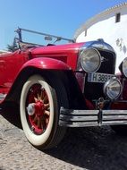 Traveling by the red antique car