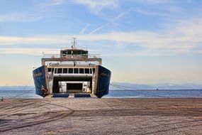 wide ferry near the shore
