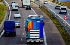 cars and trucks on the highway