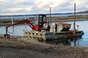 excavator on a raft