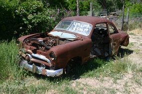 abandoned rusty Ford