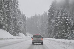 car on a winter snowy road