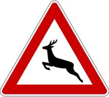 traffic sign attention on the road animals