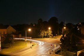 car light at bend at night