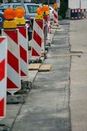 red white road poles