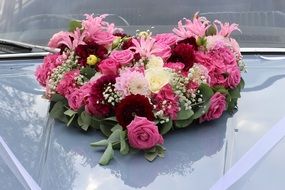 Wedding floral decorations on the car