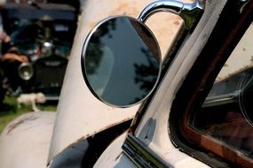 side-view mirror of vintage car