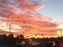 pink evening clouds over the road