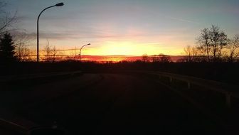 street lights on the background of a romantic sunset