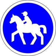 road sign with riding rider