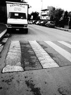 pedestrian crossing on the road in black and white background