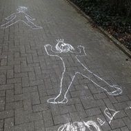 paintings with crayons on the sidewalk