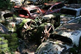 car cemetery in light and shadow
