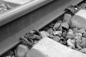 railway rails in black and white background close up