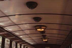 lights on the ceiling of the train car