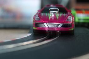 miniature pink toy car