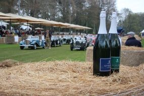 champagne bottles and oldtimer car racing