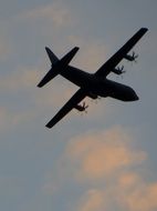 airplane silhouette under the sky