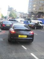 Porsche car in traffic jam, uk