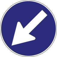 blue road sign with white arrow