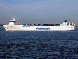 white cargo ship on sea