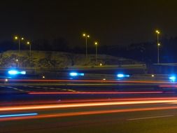 picture of the night photography of the lights on a urban street