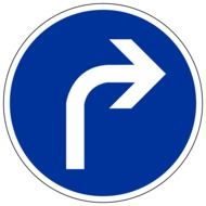 road sign with the arrow pointing to the right