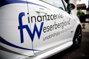 inscription on the car finanzcenter weserberglana