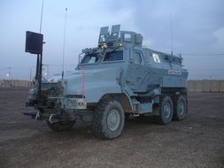 heavy armored car at dusk