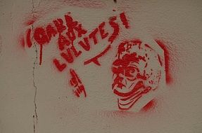 red graffiti on the wall