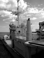 black and white photo of a motor boat