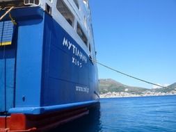 blue ship in the port of greece