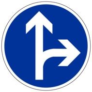 round blue road sign with arrows