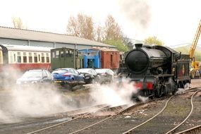 Cars near the train