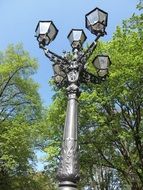 metal old street lantern in park, germany, berlin